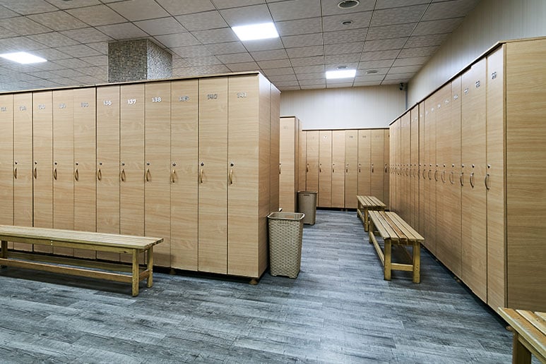 Wooden-lockers-with-a-wood-bench-in-a-locker-room-773x516