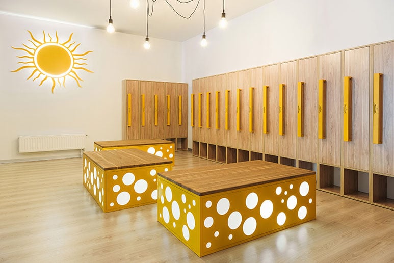 wooden-lockers-in-modern-illuminated-kindergarten-cloakroom-1